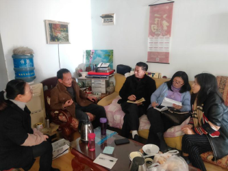 区残联工作人员入户谭先生家1